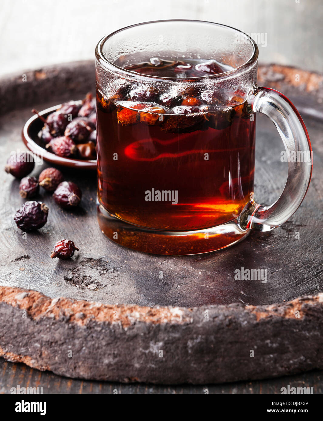 Rosehip tea on dark background Stock Photo