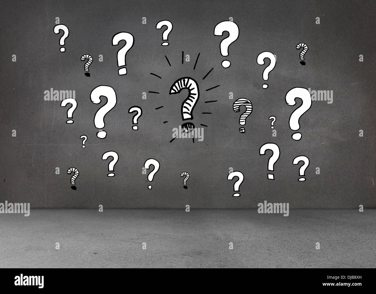White question marks on dark wall Stock Photo Alamy