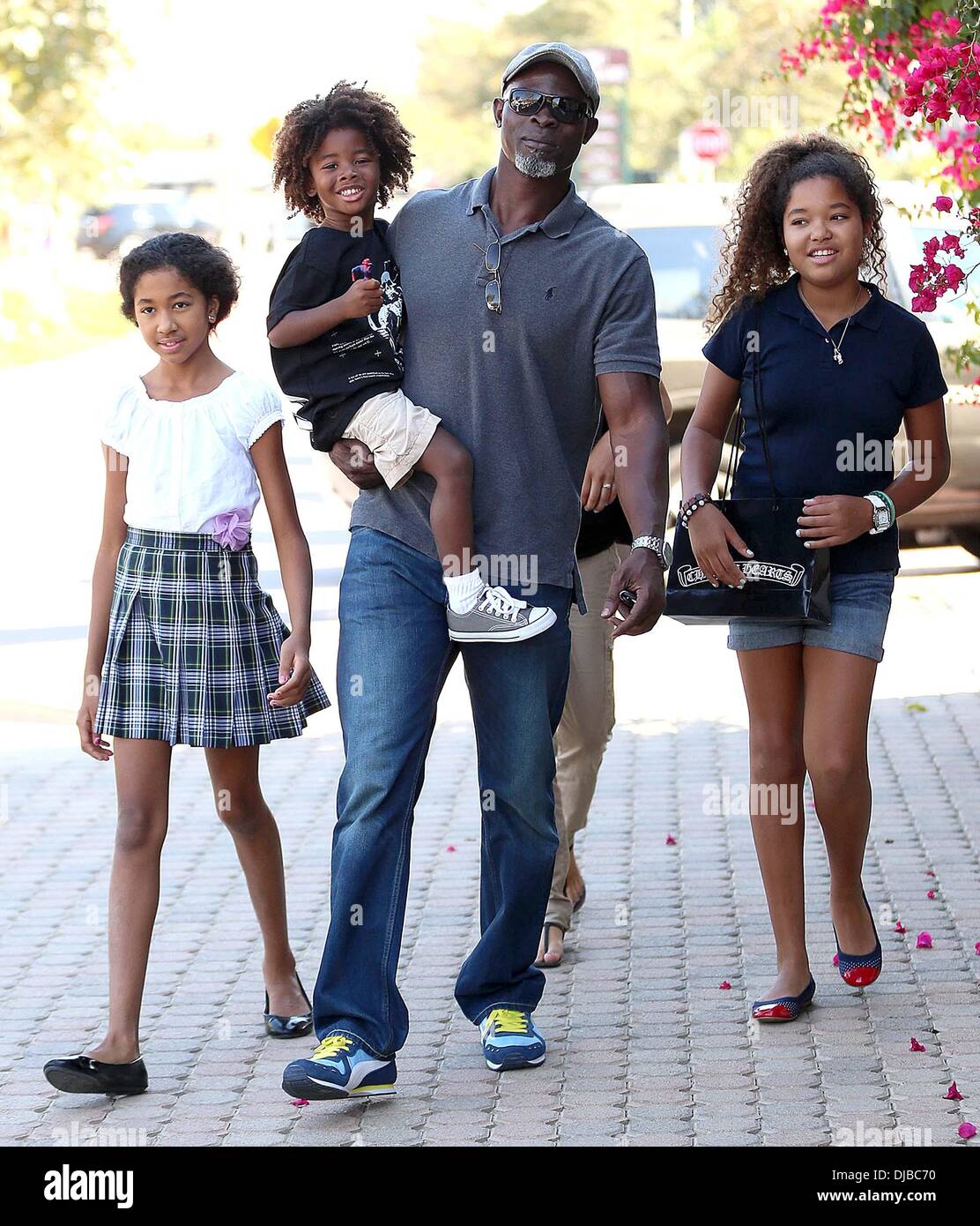 Kenzo Lee Hounsou, Djimon Hounsou, Ming Lee Simmons and Aoki Lee Simmons  Djimon Hounsou at the Malibu Country Mart with his stepdaughters and son  Los Angeles, California  Stock Photo - Alamy