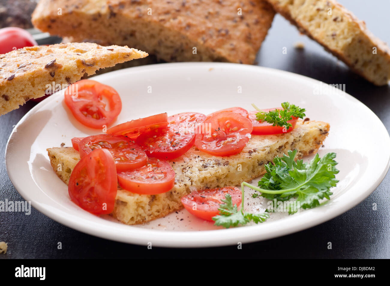 Homemade low carb high fat (lchf) bread . Sea salt and black pepper. Stock Photo