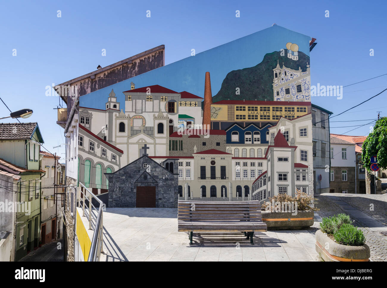 Large urban artwork on the side of a building, part of WOOL, the Urban Art Festival of Covilha Stock Photo