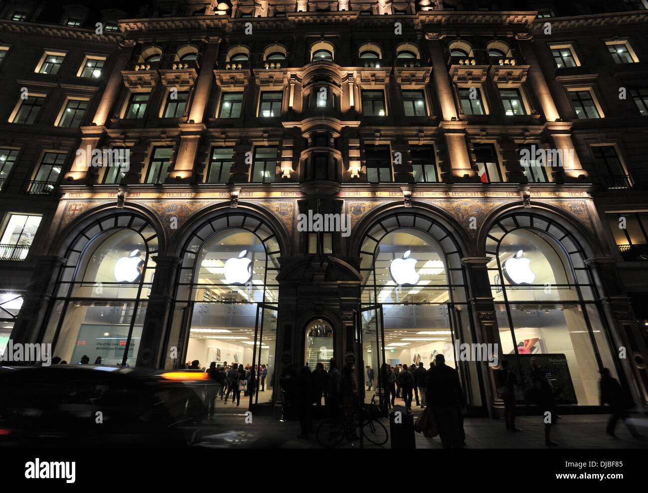 Customers are shopping at Apple's Regent Street store before the company's new iPhone 5 goes on sale the next morning. London, England - 20.09.12 Stock Photo