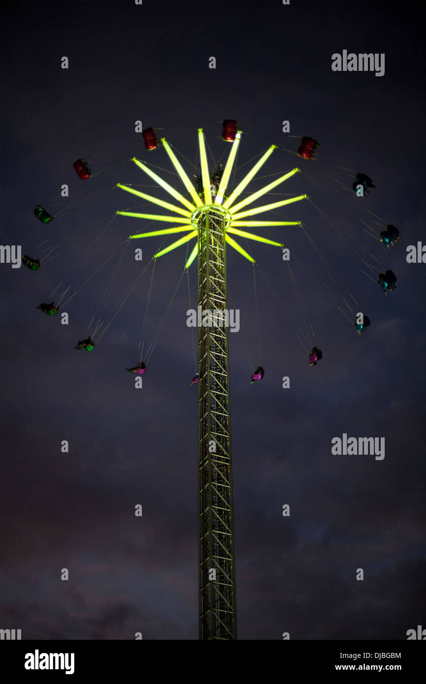 The 'Star Flyer', a 60-metre high chairoplane ride at the 2013 Christmas Fair in Edinburgh, Scotland Stock Photo