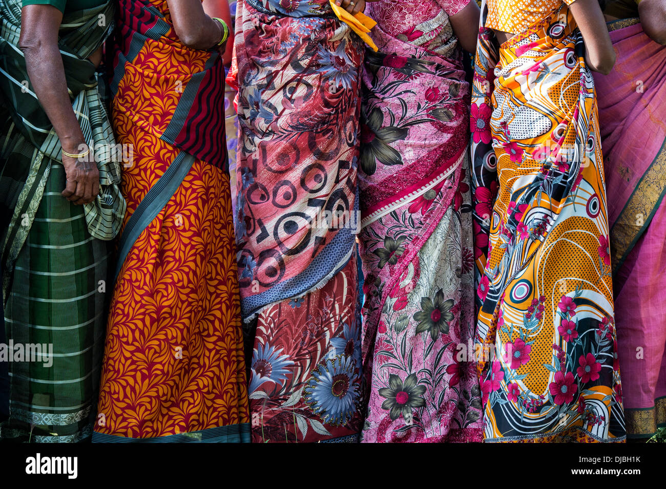 Indian woman wearing red sari hi-res stock photography and images - Alamy