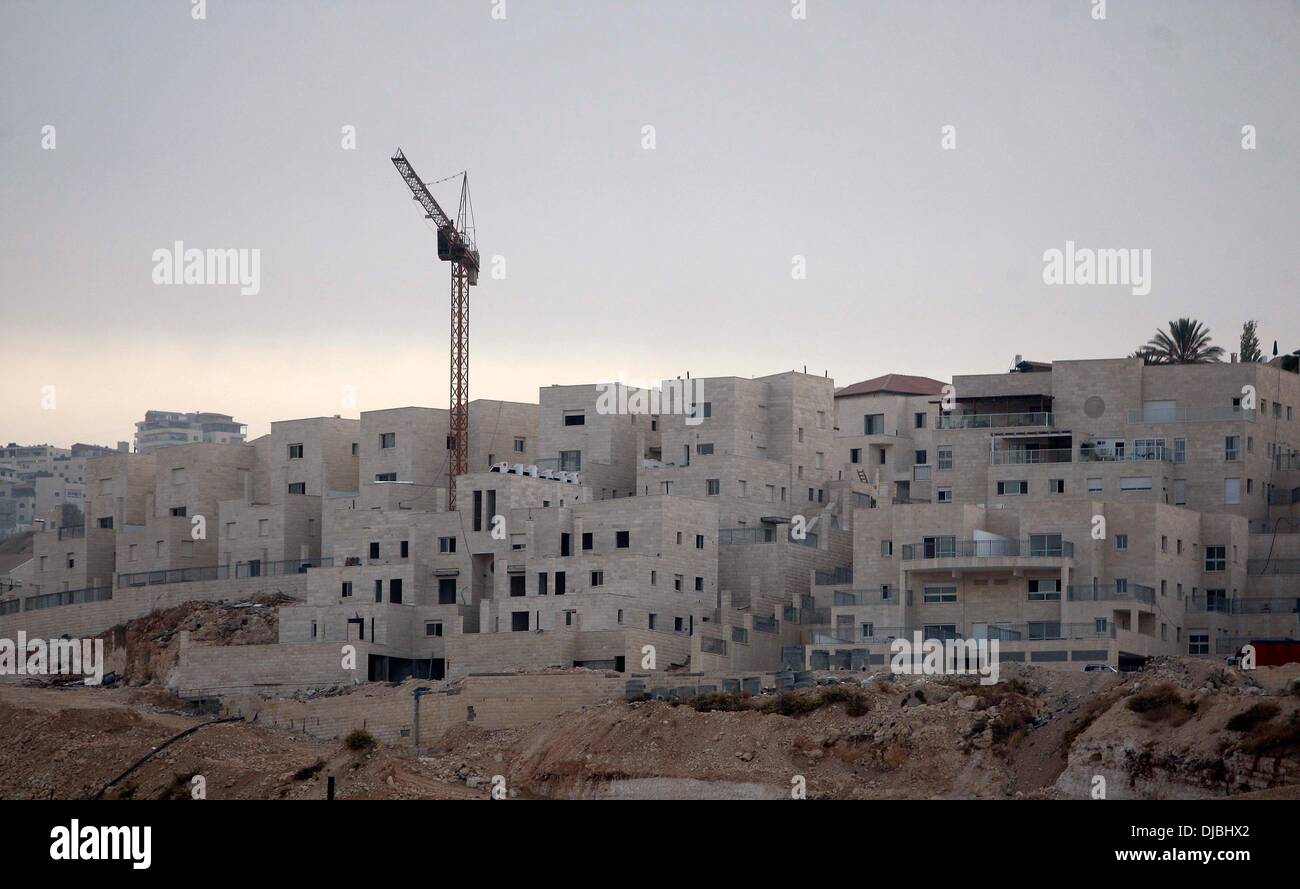 Jerusalem, North Jerusalem. 26th Nov, 2013. A construction site is seen in Pisgat Zeev, an urban settlement in an area Israel annexed to Jerusalem after the 1967 Middle East war, near the Arab village of Beit Hanina, North Jerusalem, on Nov. 25, 2013. The Civil Administration, the Israeli body governing the occupied West Bank territories, approved on Nov. 24 the construction of 799 new housing units in West Bank settlements, the Ha'aretz daily reported. © Muammar Awad/Xinhua/Alamy Live News Stock Photo