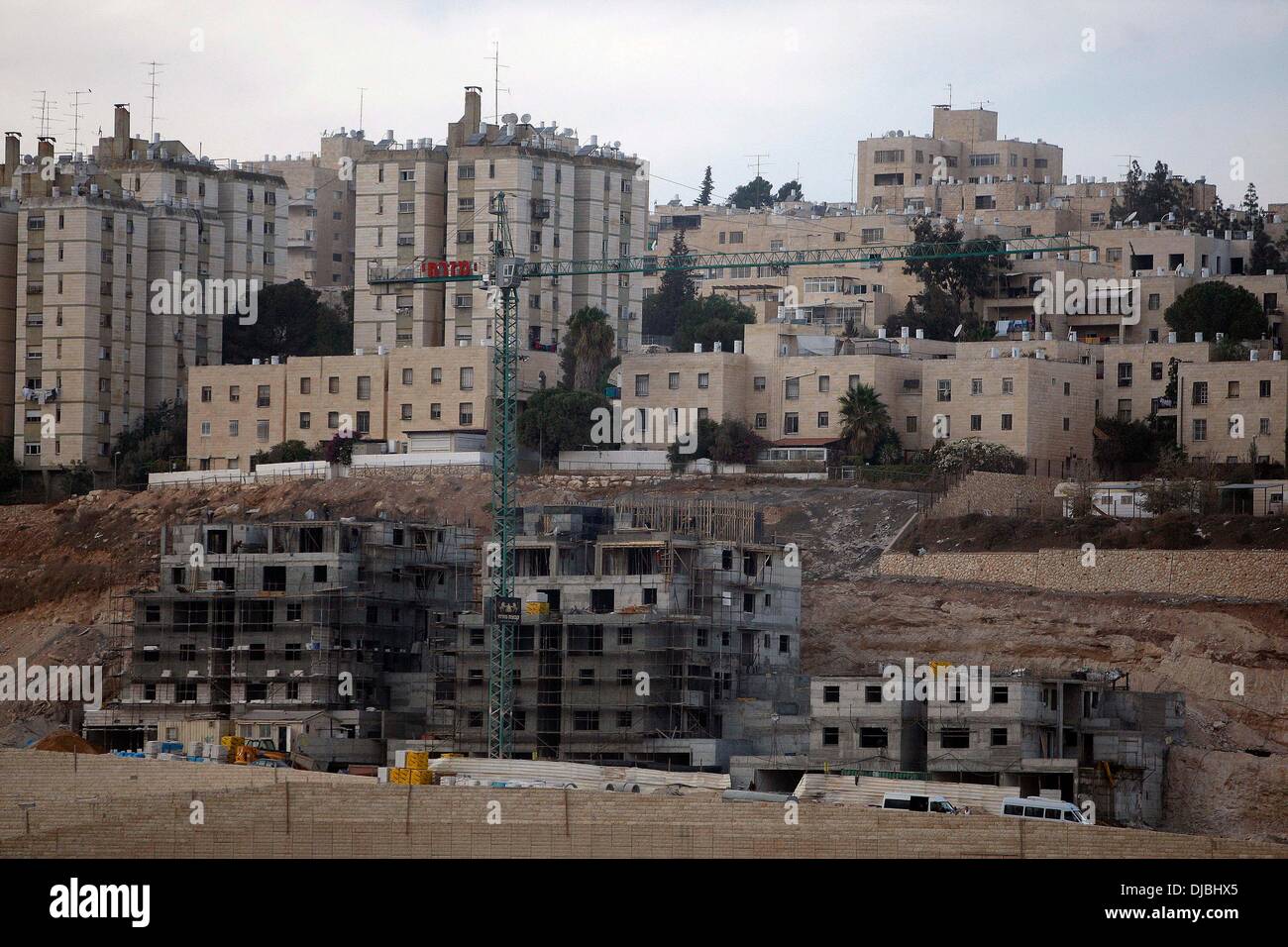 Jerusalem, North Jerusalem. 26th Nov, 2013. A construction site is seen in Pisgat Zeev, an urban settlement in an area Israel annexed to Jerusalem after the 1967 Middle East war, near the Arab village of Beit Hanina, North Jerusalem, on Nov. 25, 2013. The Civil Administration, the Israeli body governing the occupied West Bank territories, approved on Nov. 24 the construction of 799 new housing units in West Bank settlements, the Ha'aretz daily reported. © Muammar Awad/Xinhua/Alamy Live News Stock Photo