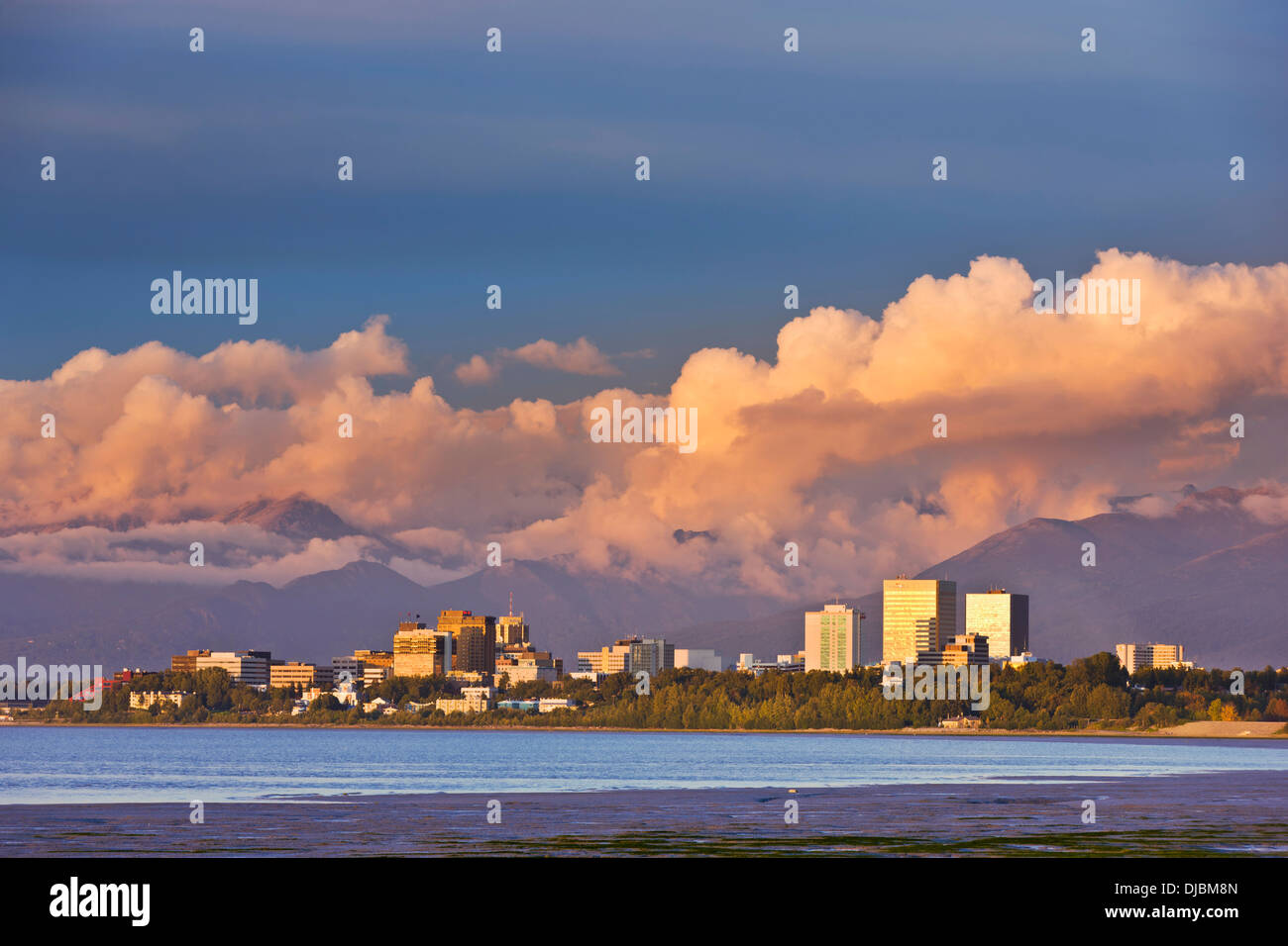 Sunset Light Illuminates The Downtown Anchorage Skyline And Coastal ...