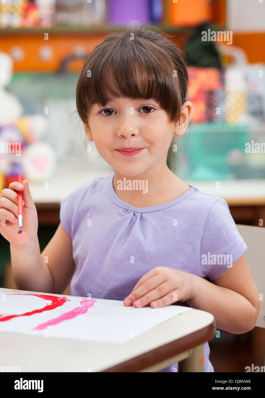 Cute Little Girl Painting In Art Class Stock Photo - Alamy