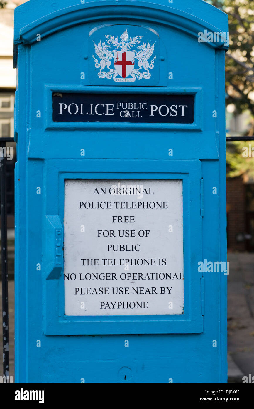 An Original Police Telephone Box in London England Stock Photo