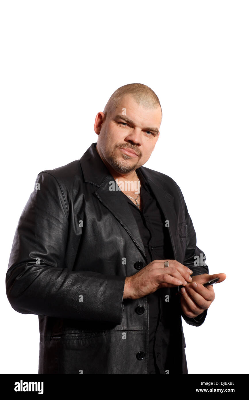serious man holding touch screen mobile phone Stock Photo