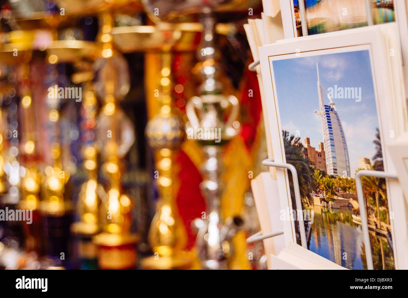 Burj Al Arab postcards and hookahs for sale at Bur Dubai Souk. Dubai, United Arab Emirates Stock