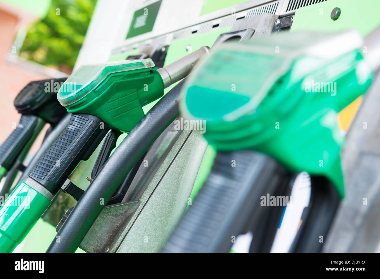 Petrol pumps at a petrol station displaying petrol and diesel pumps Stock Photo