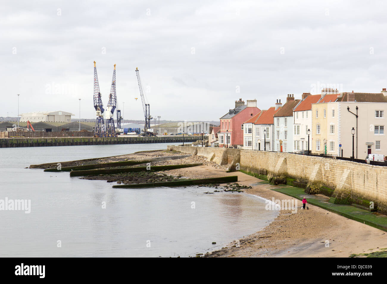 The town wall at the Headland Hartlepool cranes and houses Stock Photo