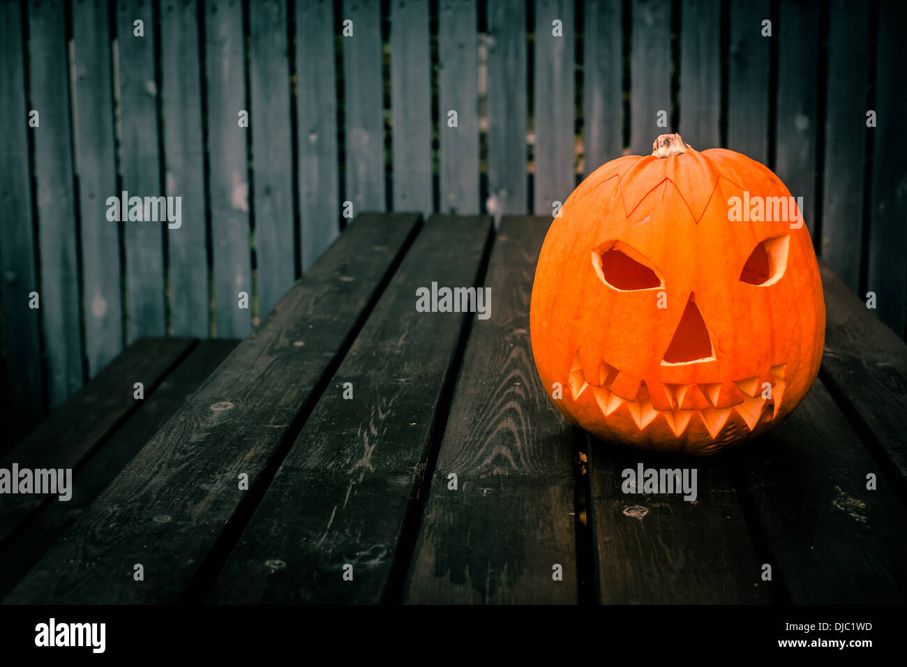 Jack-o-lantern pumpkin head at halloween Stock Photo
