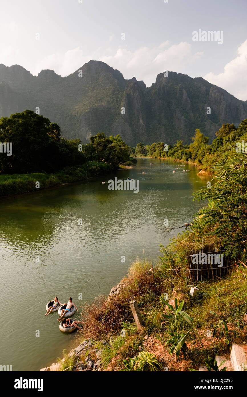 Tubing on the Nam Song river in Vang Vieng, Vientiane, Laos Stock Photo