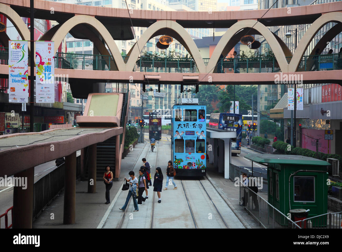 Double decker tramway downtown in Central Hong Kong, China Stock Photo