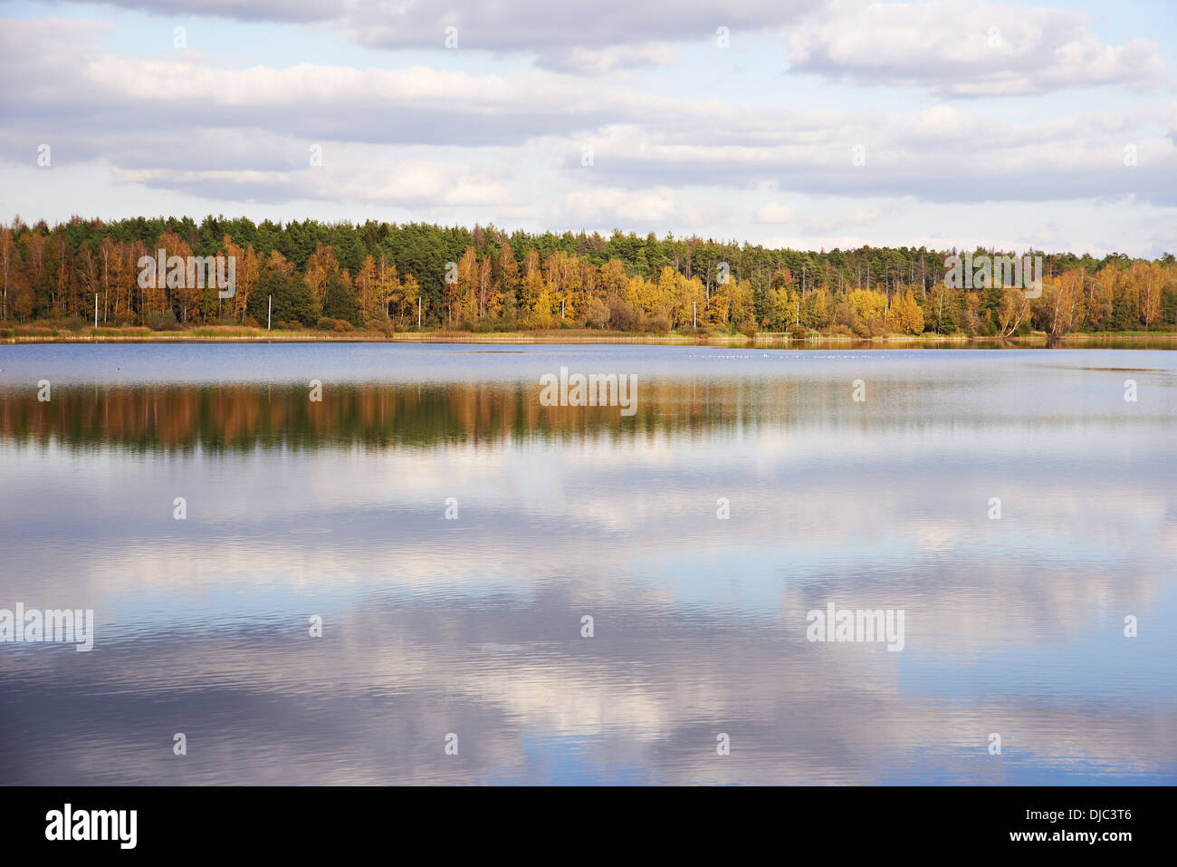 Autumn landscape with lake, forest and clouds sky Stock Photo - Alamy