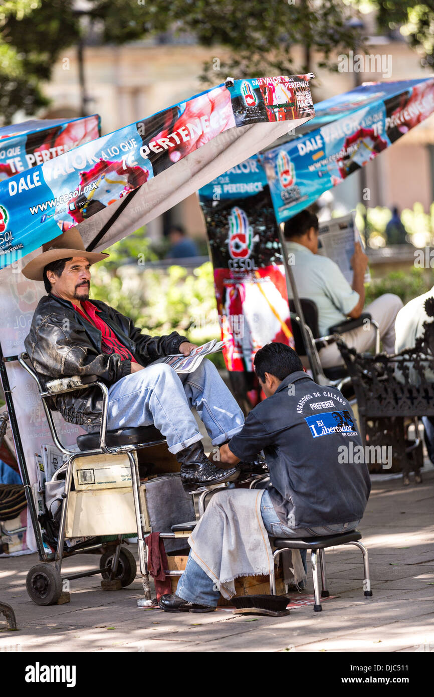 Shoe shine stands in the historic Zocalo or plaza in Oaxaca, Mexico. Stock Photo