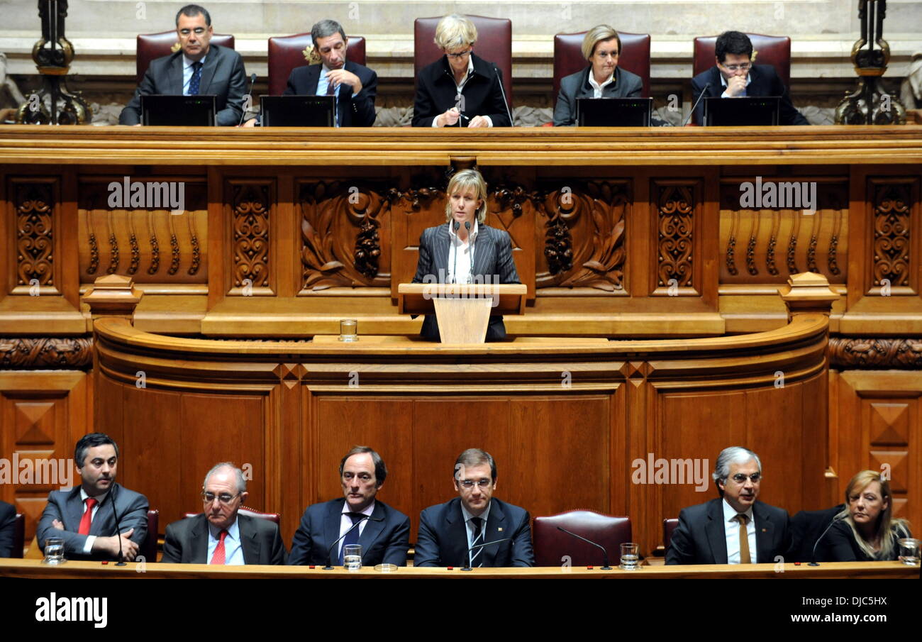 Lisbon, Portugal. 26th Nov, 2013. Portugal's Finance Minister Maria Luis Albuquerque (C) speaks during a Parliament session to vote the government's 2014 draft budget in Lisbon, Portugal, Nov. 26, 2013. The Portuguese Parliament adopted Tuesday the tough 2014 draft budget to save the bailout country some 3.9 billion euros (5.29 U.S. dollars) through spending cuts and tax increase amid strong protests. Credit:  Zhang Liyun/Xinhua/Alamy Live News Stock Photo