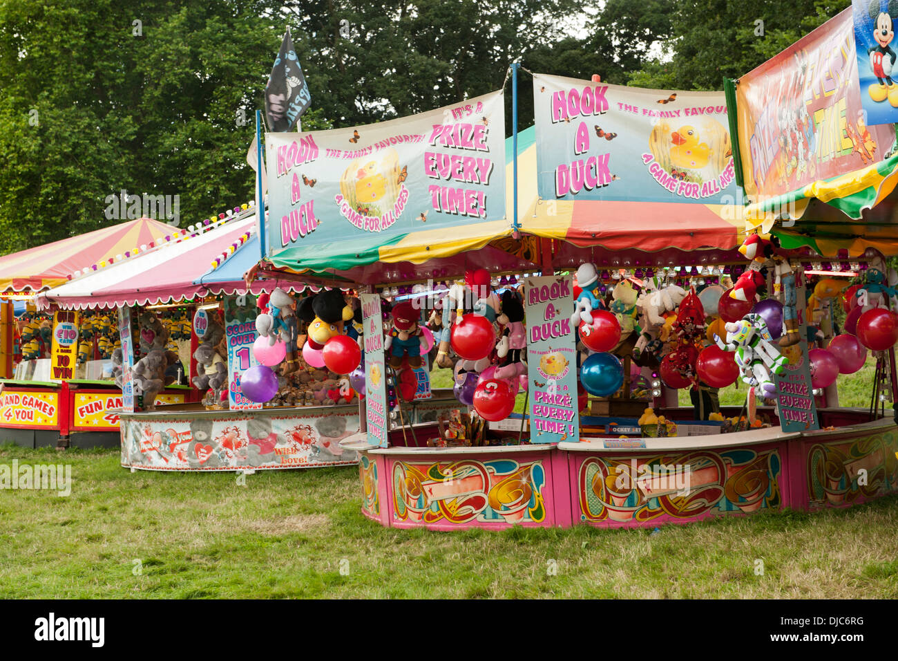 Fairground attractions at the Bristol Balloon Fiesta in Bristol, England. Stock Photo
