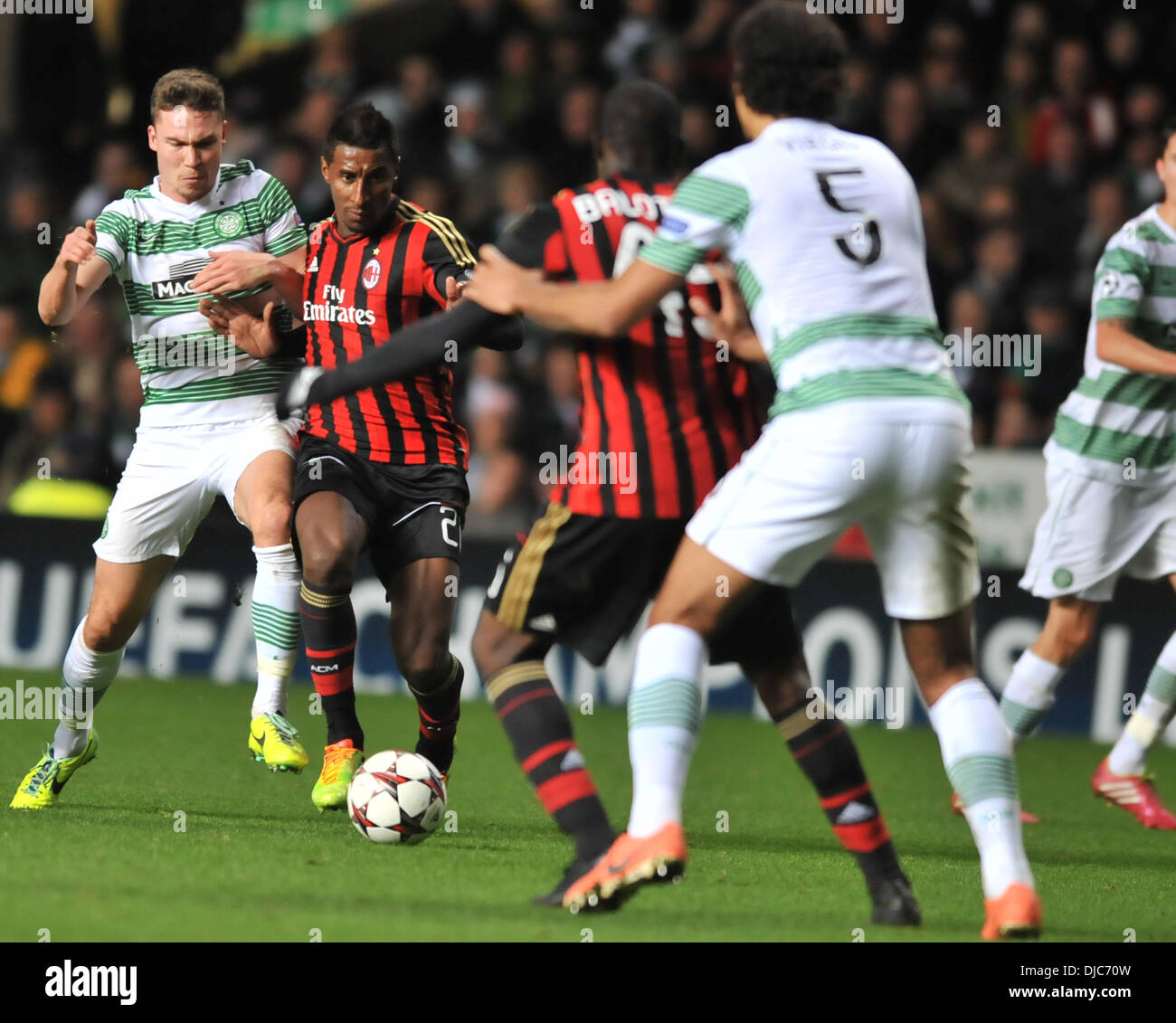 Glasgow, Scotland. 26th Nov, 2013. AC Milan's Kevin Constant wins this battle during the UEFA Champions League Group H, game between Celtic FC and AC Milan. From Celtic Park Stadium, Glasgow. Credit:  Action Plus Sports/Alamy Live News Stock Photo