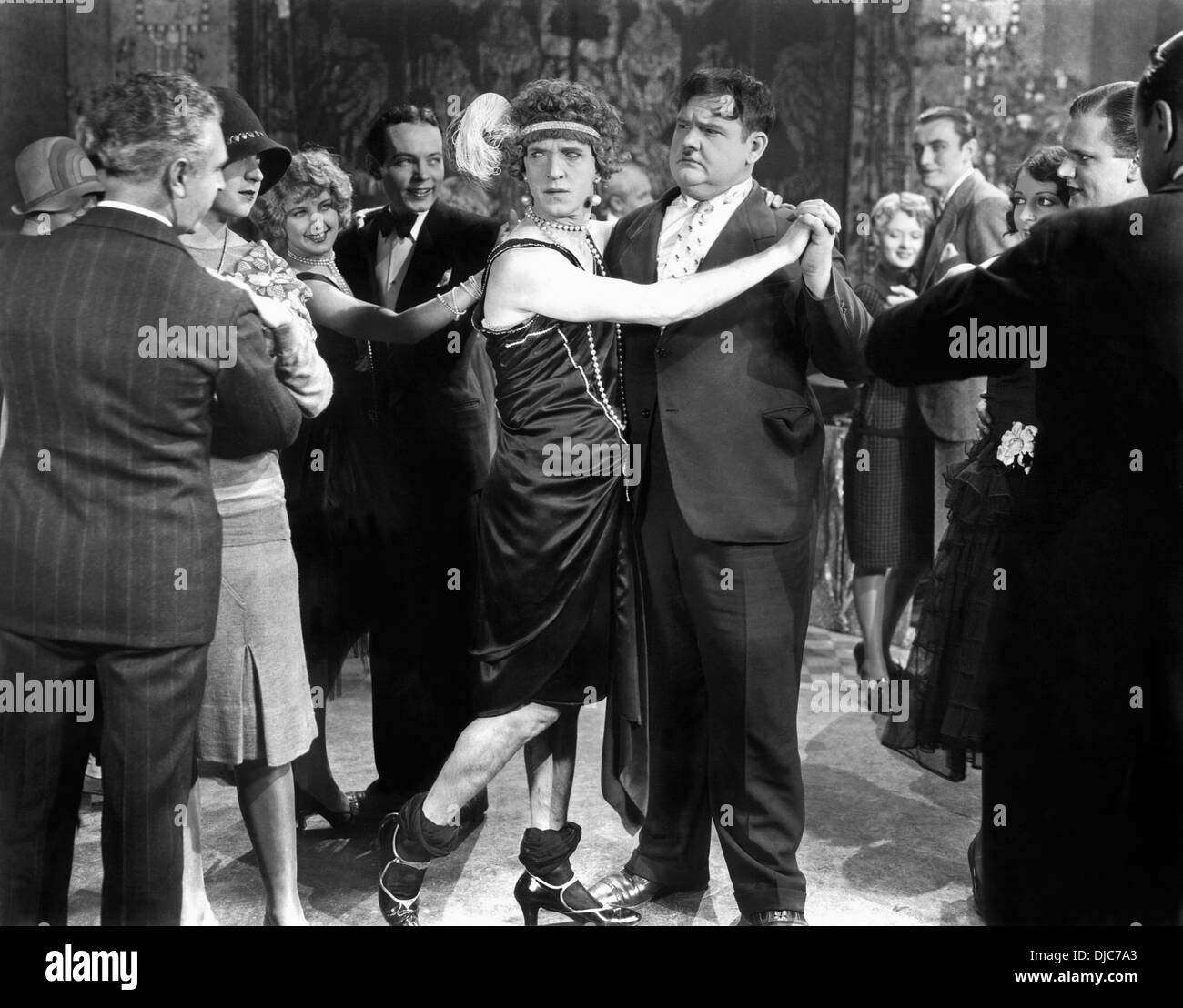 Stan Laurel and Oliver Hardy (center) on-set of the Film, That's My Wife, 1929 Stock Photo