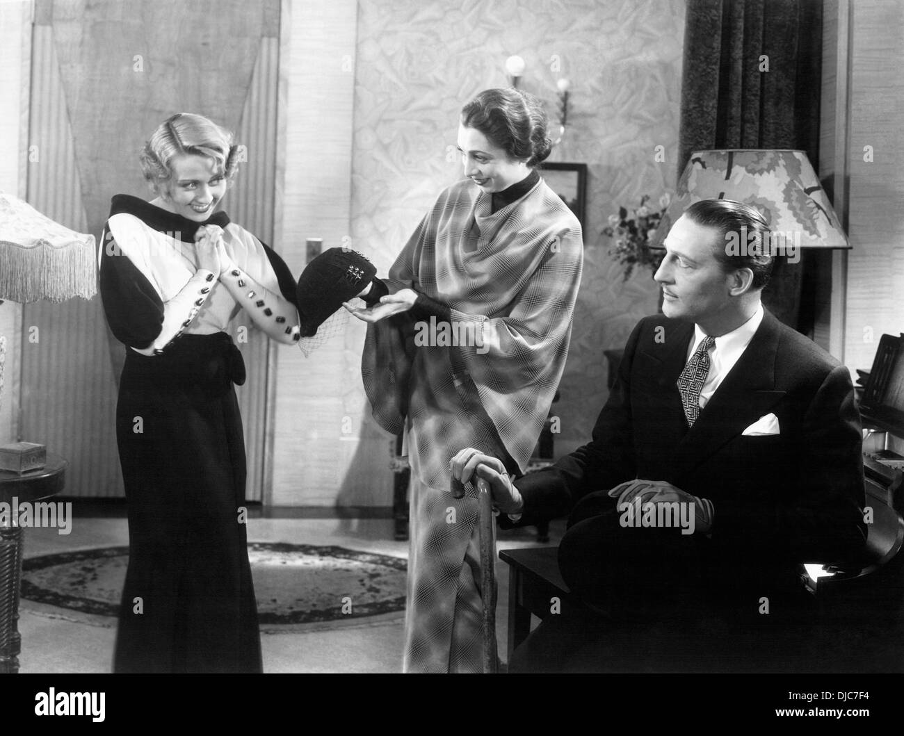 Joan Blondell, Aline MacMahon and Warren William on-set of the Film, Gold Diggers of 1933 Stock Photo