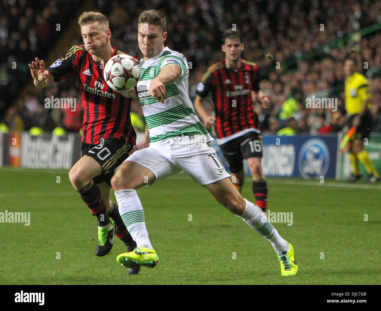 Glasgow, Scotland. 26th Nov, 2013. Derk Boerrigter challenges Ignazio Abate during the Champions League game between Celtic and AC Milan from Celtic Park. Credit:  Action Plus Sports/Alamy Live News Stock Photo
