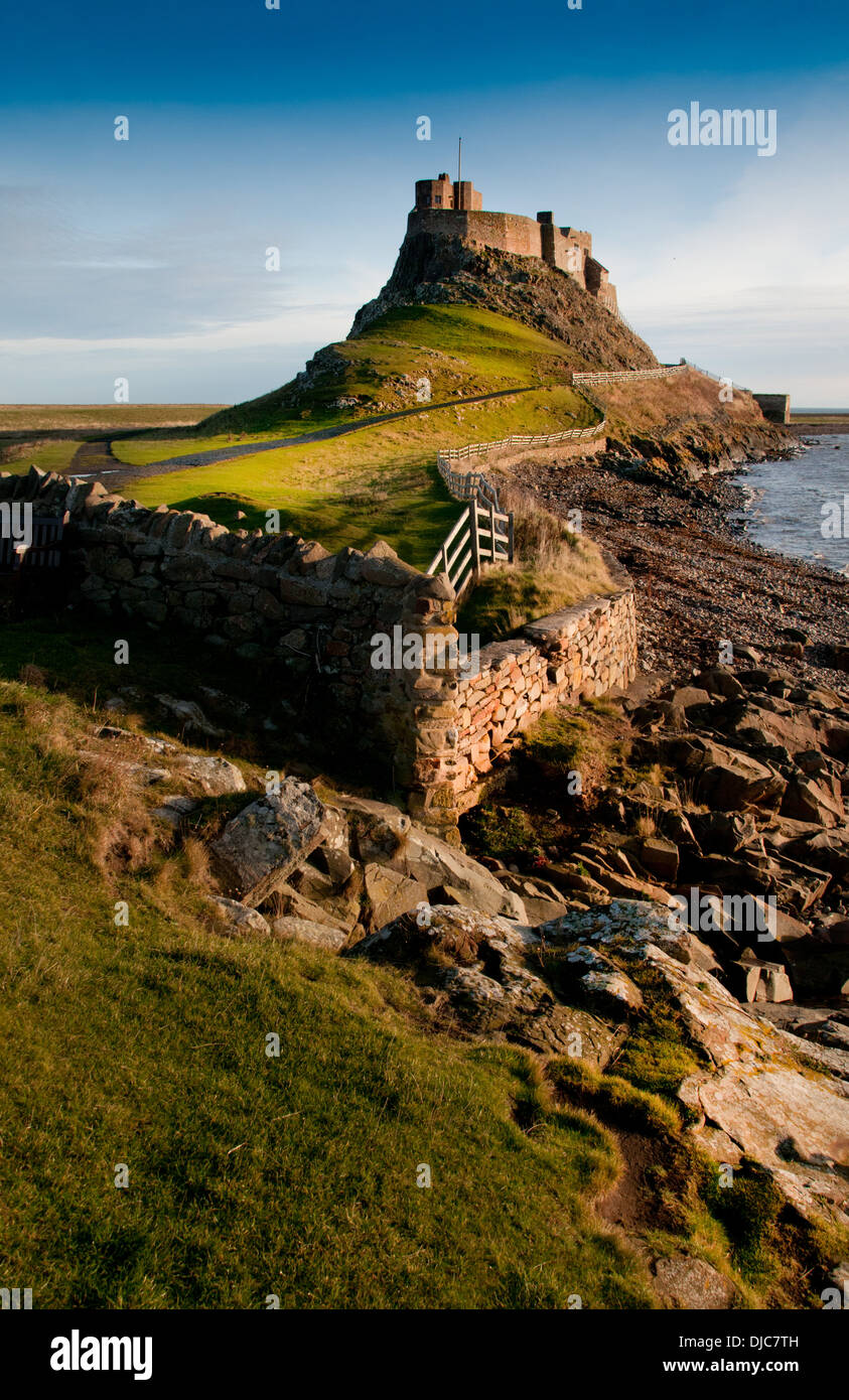 Holy Island and the castle that defended the harbour Lindisfarne Castle Stock Photo