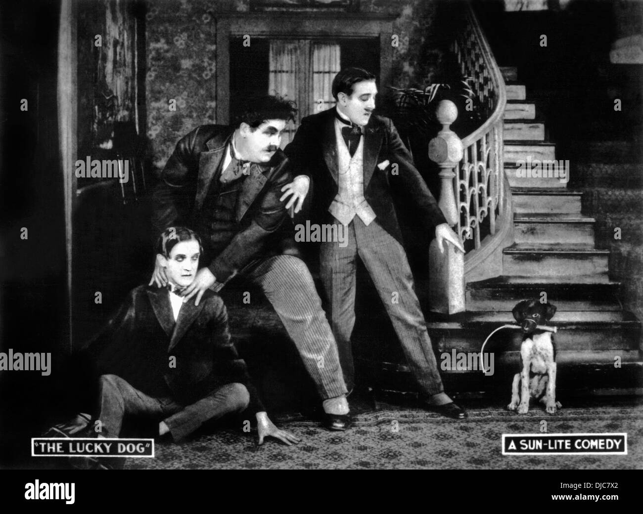 Stan Laurel, Oliver Hardy & Jack Lloyd on-set of the Film, Lucky Dog, 1921 Stock Photo