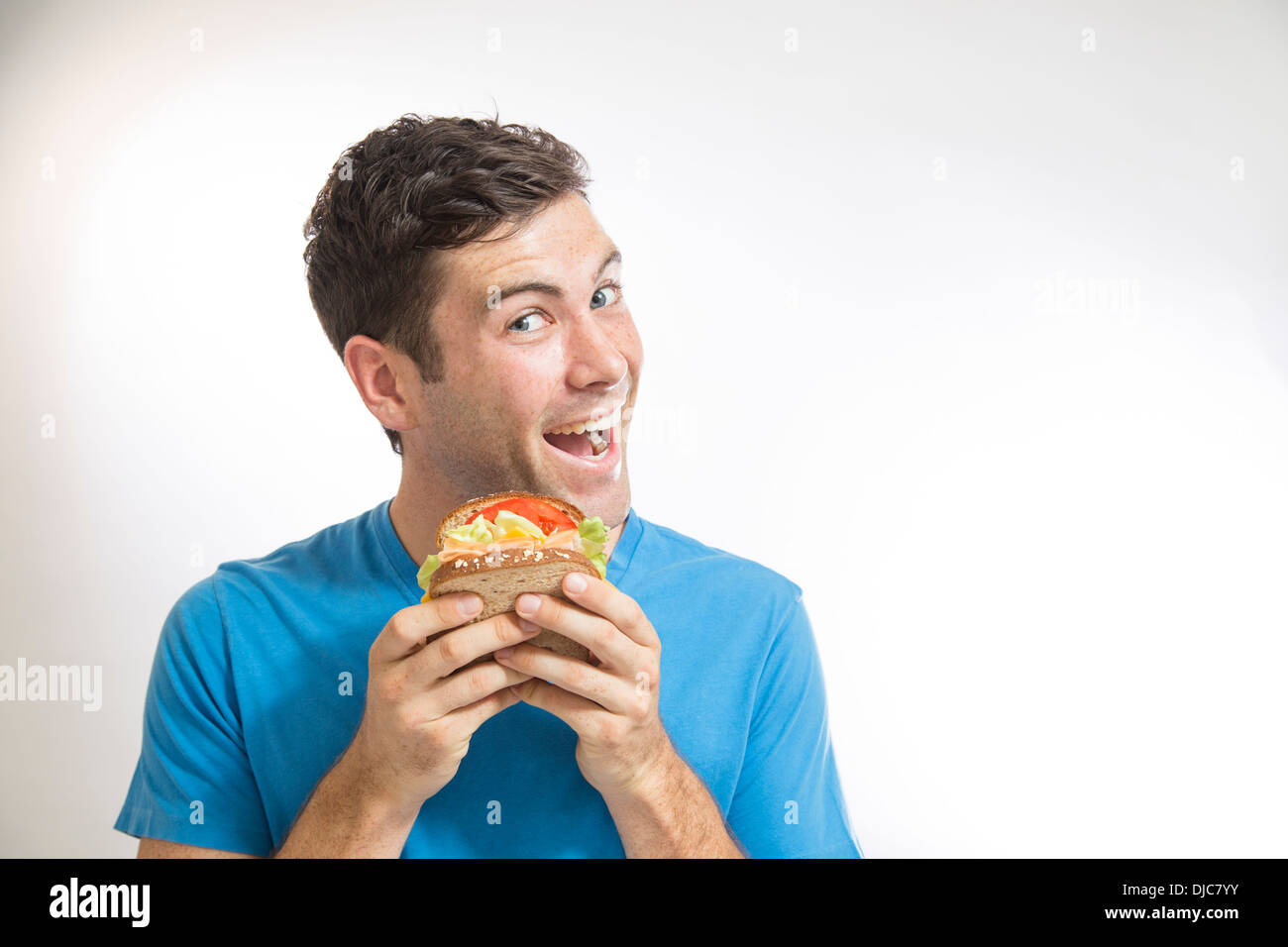 Males hands holding sandwich and thermos mug during eating his lunch Stock  Photo - Alamy