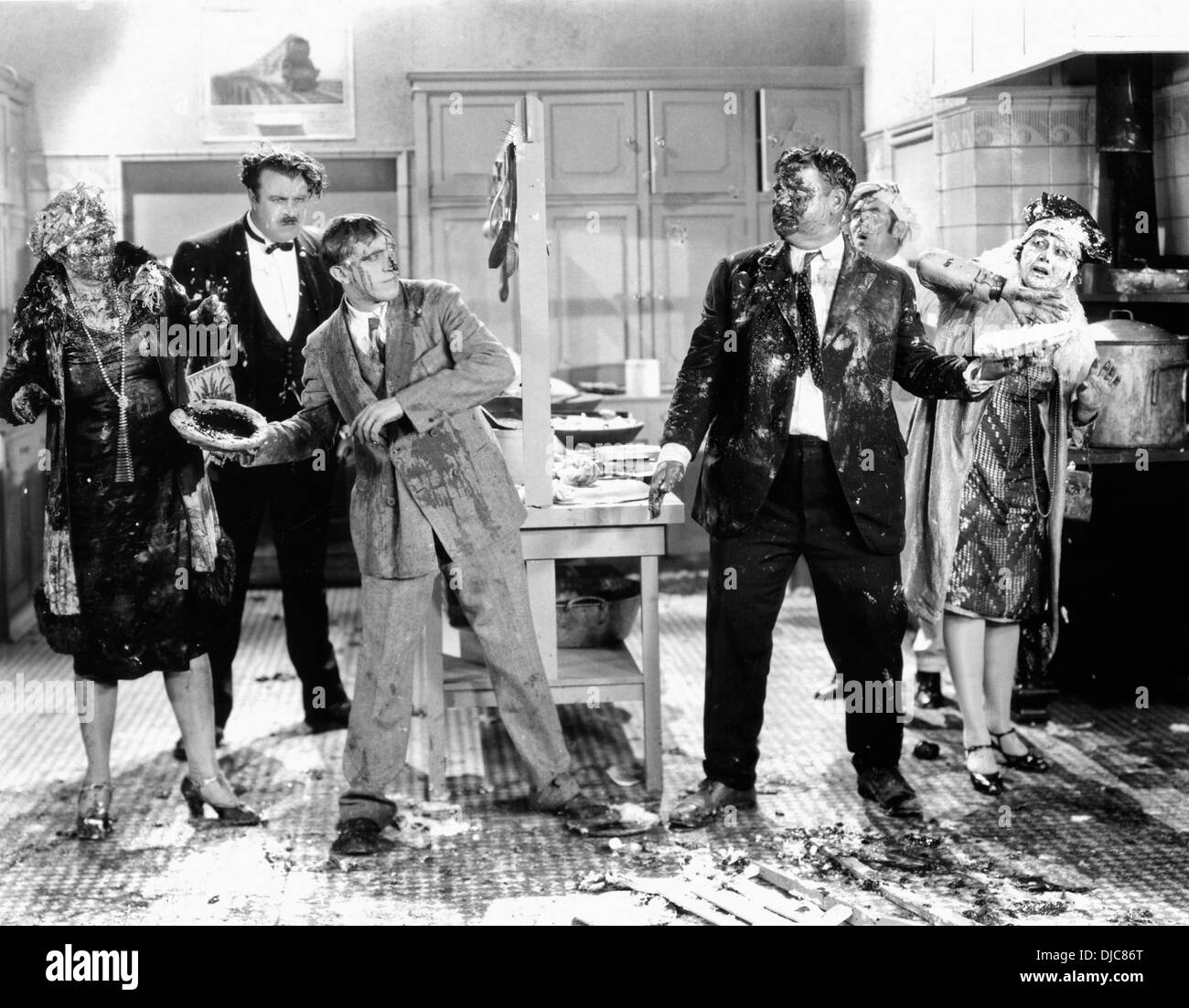 Kay Deslys, Tiny Sandford, Stan Laurel, Oliver Hardy and Anita Garvin on-set of the Film, Their Purple Moment, 1928 Stock Photo