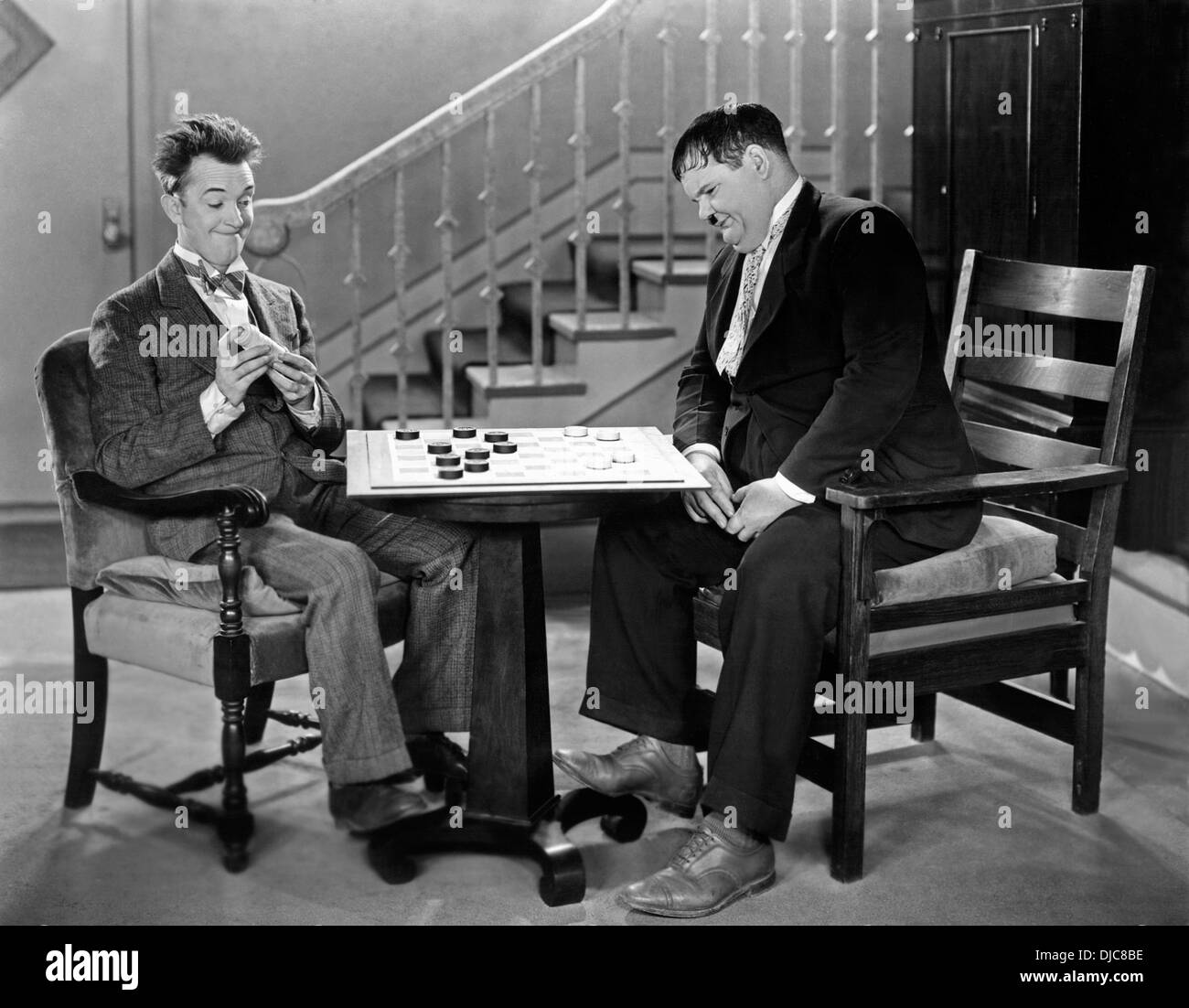 Stan Laurel and Oliver Hardy on-set of the Film, Brats, 1930 Stock Photo
