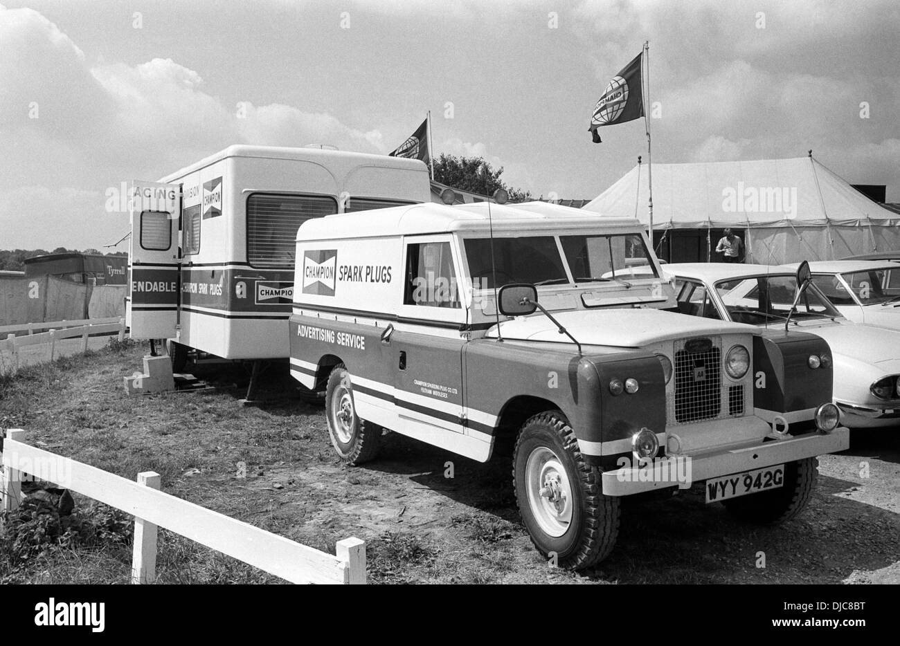 Champion Spark Plugs Land Rover and caravan in the paddock at the British GP, Brands Hatch, England 18 July 1970. Stock Photo