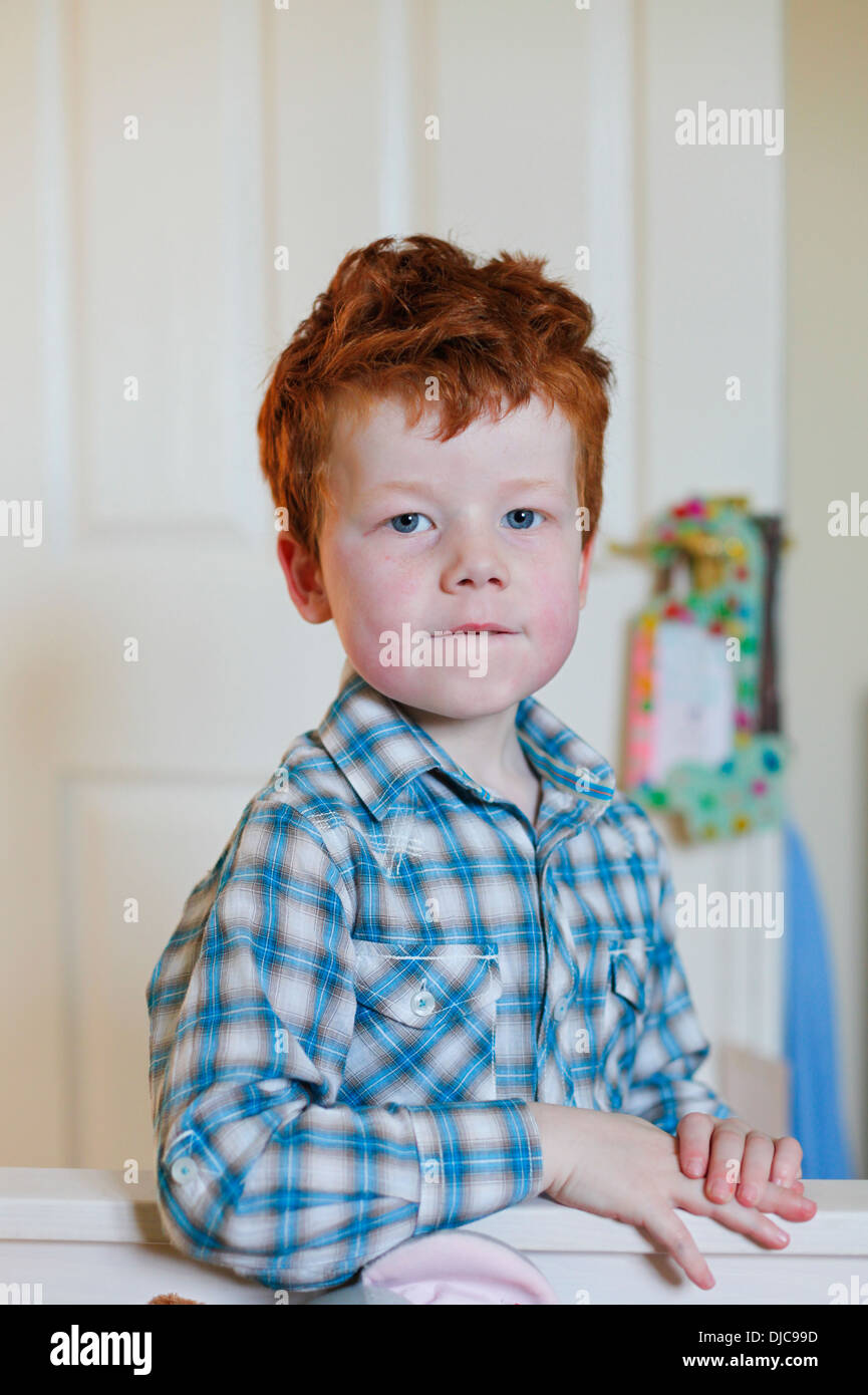 Portrait of a six year old boy after he has got out of bed Stock Photo