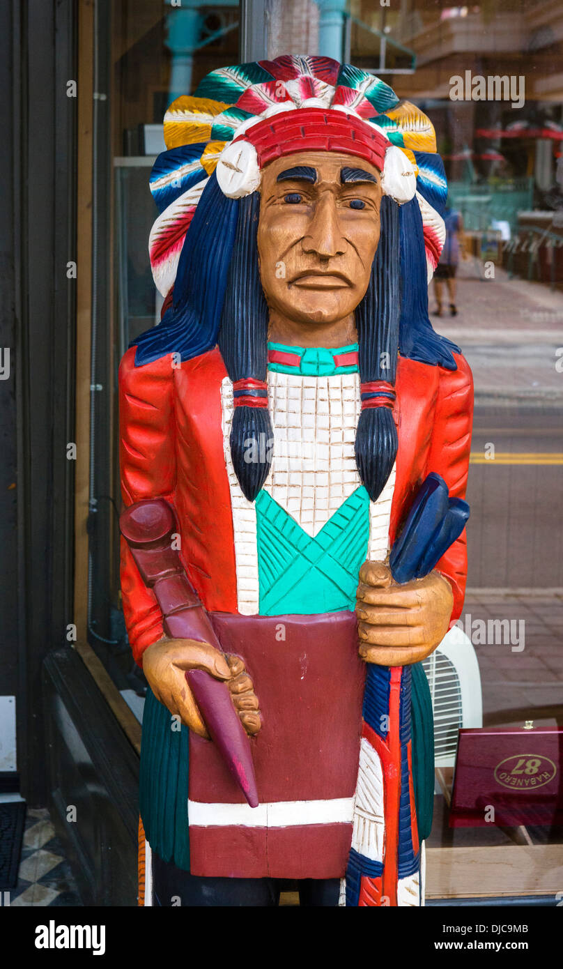 Cigar store indian outside a cigar shop on Seventh Avenue in historic Ybor City, Tampa, Florida, USA Stock Photo