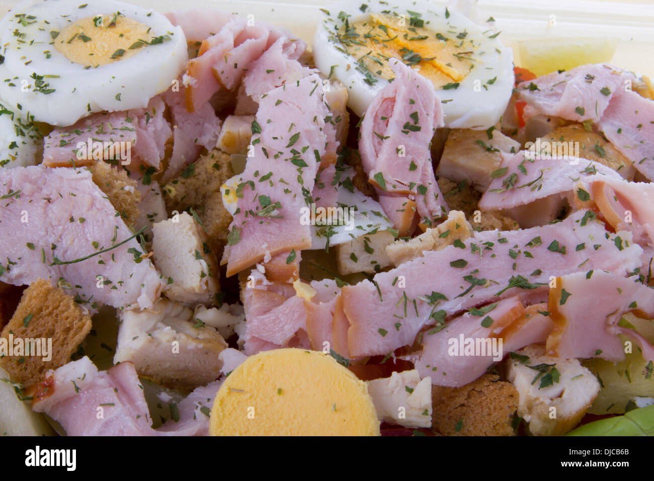 chicken salad with sirloin and eggs and bread cubes Stock Photo Alamy