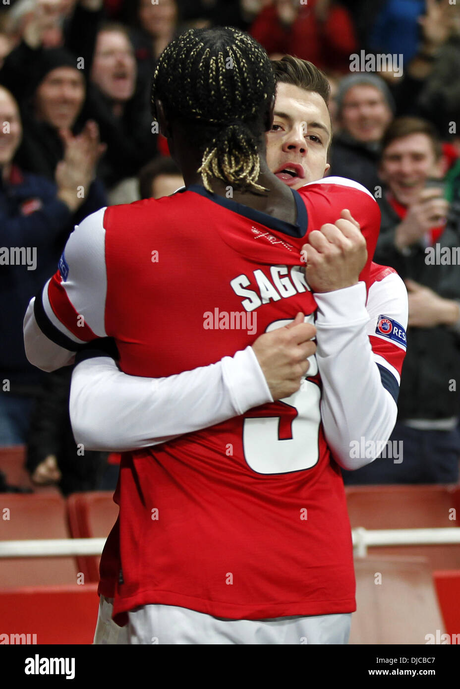 London, UK. 26th Nov, 2013. ( Jack Wilshere (R) of Arsenal celebrates his first goal with teammate Bacary Sagna during the UEFA Champions League Group F match between Arsenal and Marseille at Emirates Stadium in London, Britain on Nov. 26, 2013. Arsenal won 2-0 Credit:  Xinhua/Alamy Live News Stock Photo