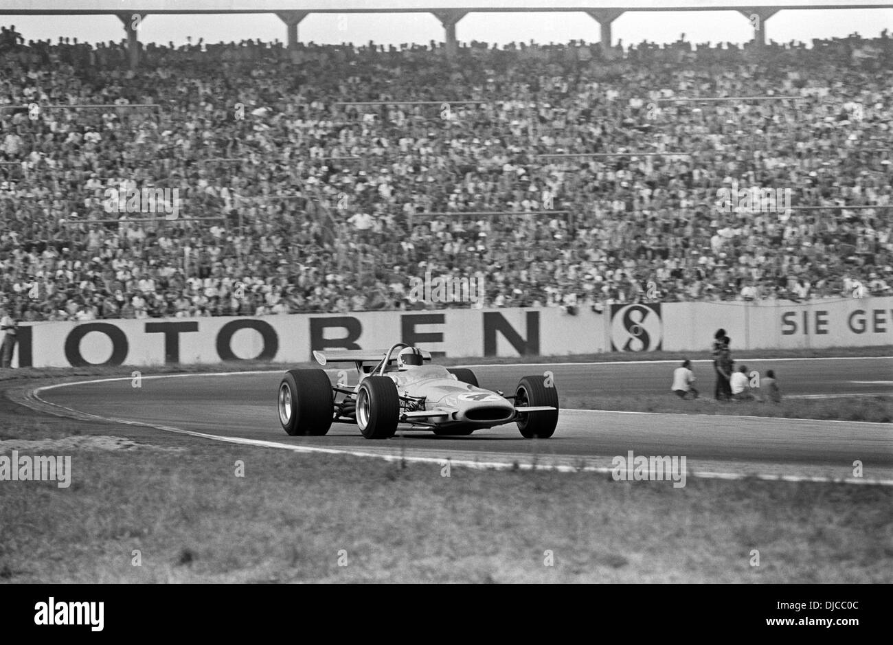 Denny Hulme in a McLaren Cosworth M14A in the German GP, Hockenheim, Germany 2 Aug 1970. Stock Photo