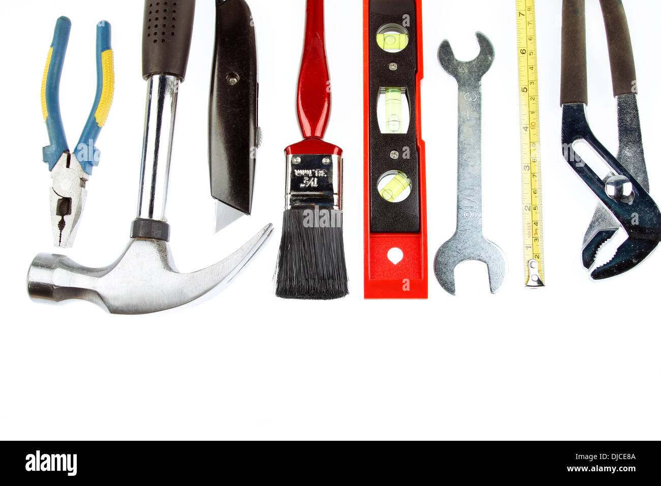Assortment of tools on plain background Stock Photo
