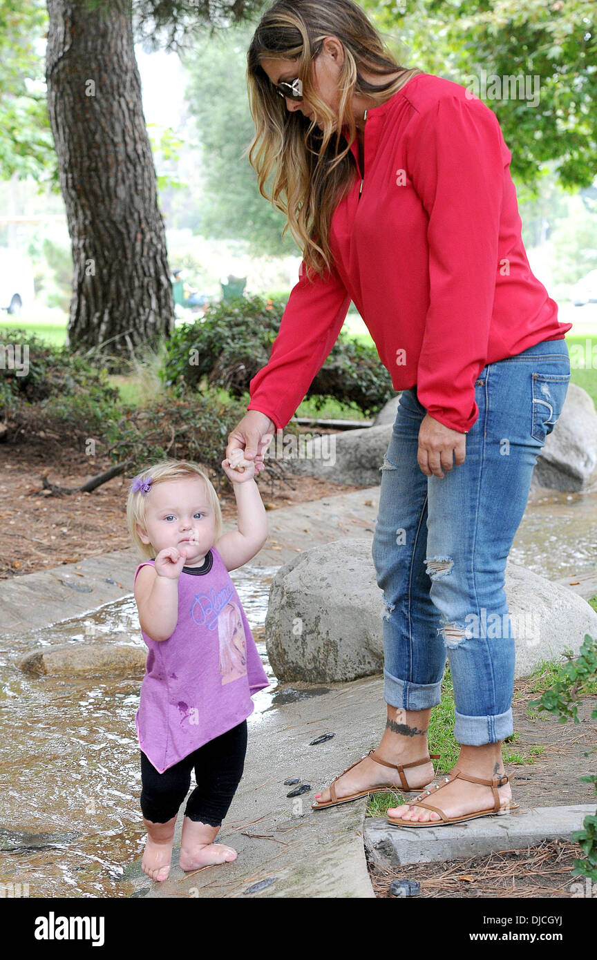 Nicole Eggert and daughter Keegan Former 'Baywatch' star takes her daughter to a park in Beverly Hills Los Angeles, California - 23.08.12 Stock Photo