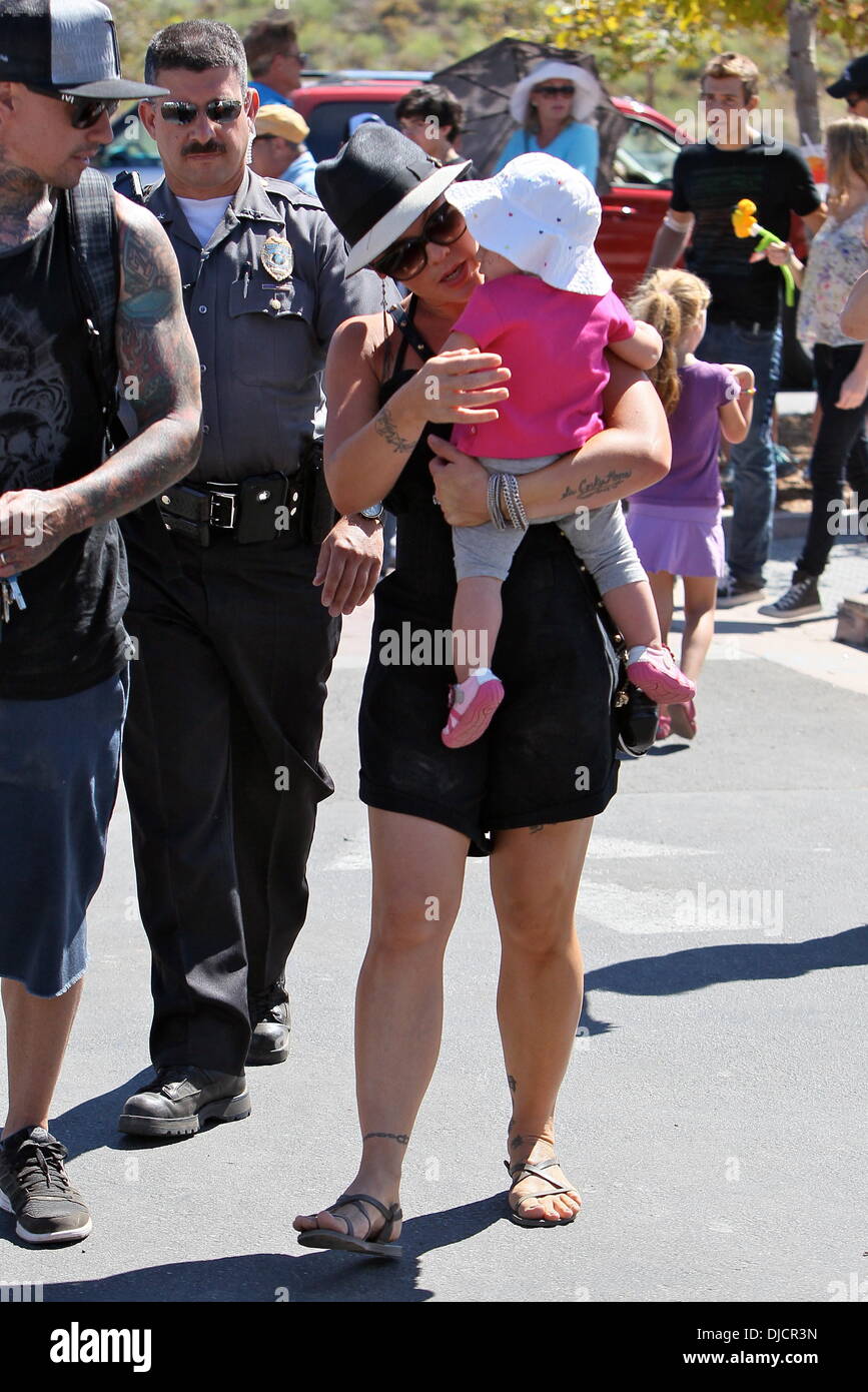 Pink aka Alecia Beth Moore, Willow Sage Hart, and Carey Hart Pink enjoys a day with her family at a chili cook-off in Malibu Los Angeles, California - 02.09.12 Stock Photo