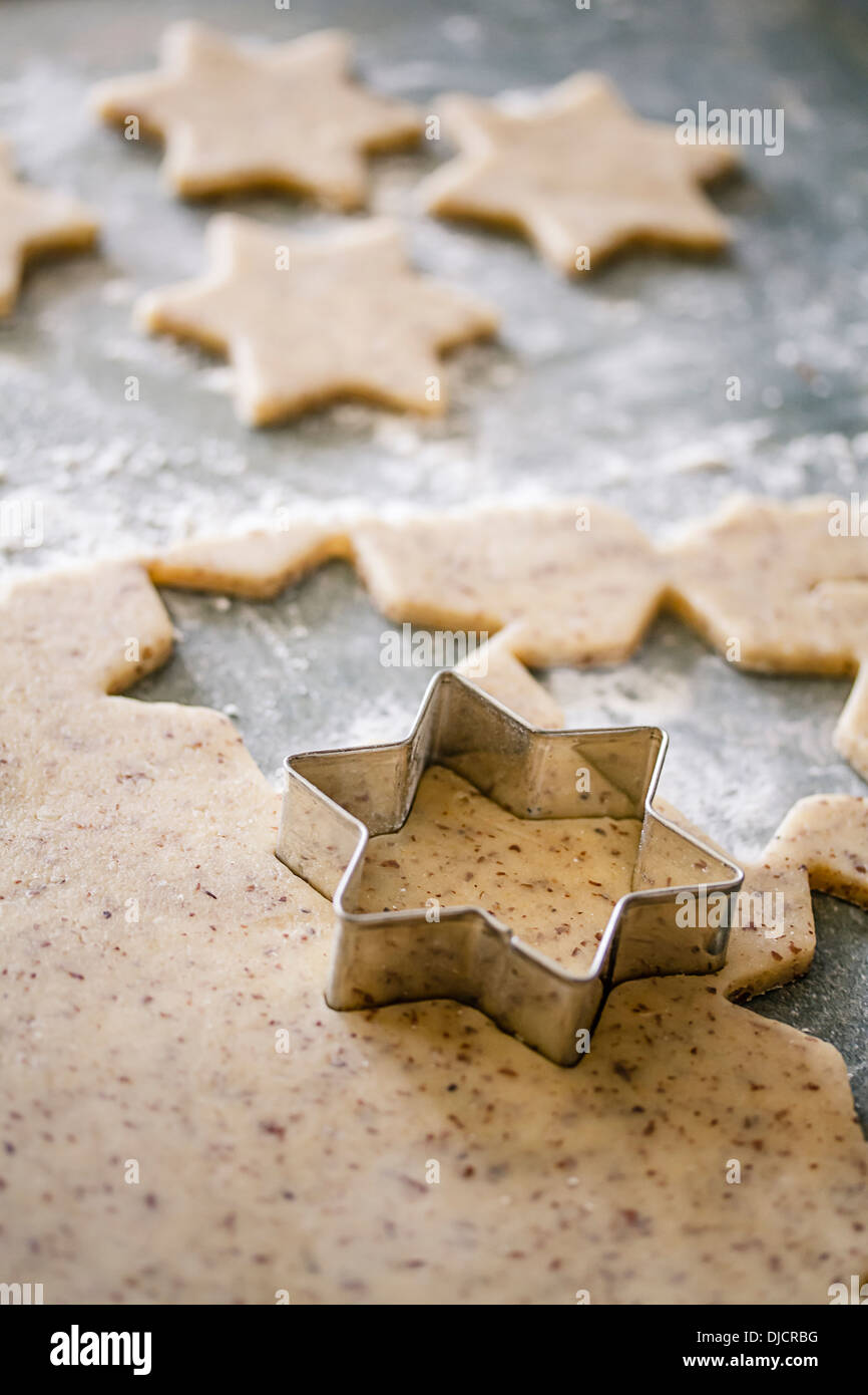 cutting-out-star-shaped-christmas-cookies-stock-photo-alamy