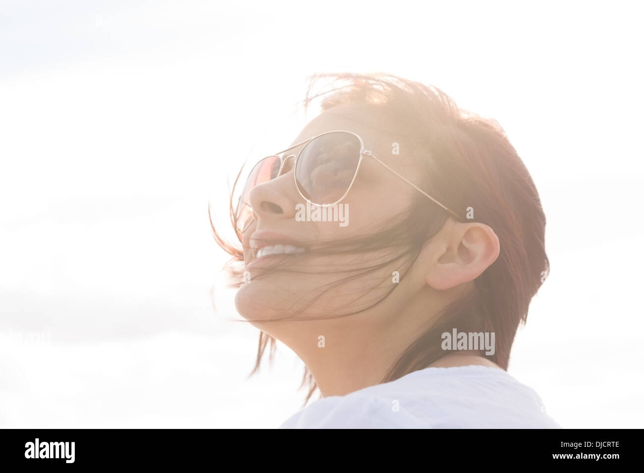 Woman looking up sky hi-res stock photography and images - Alamy
