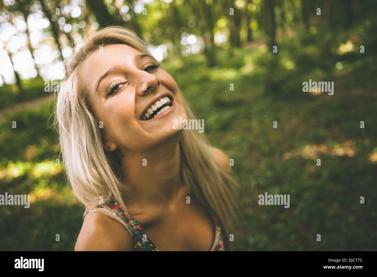 Cheerful gorgeous blonde looking at camera Stock Photo