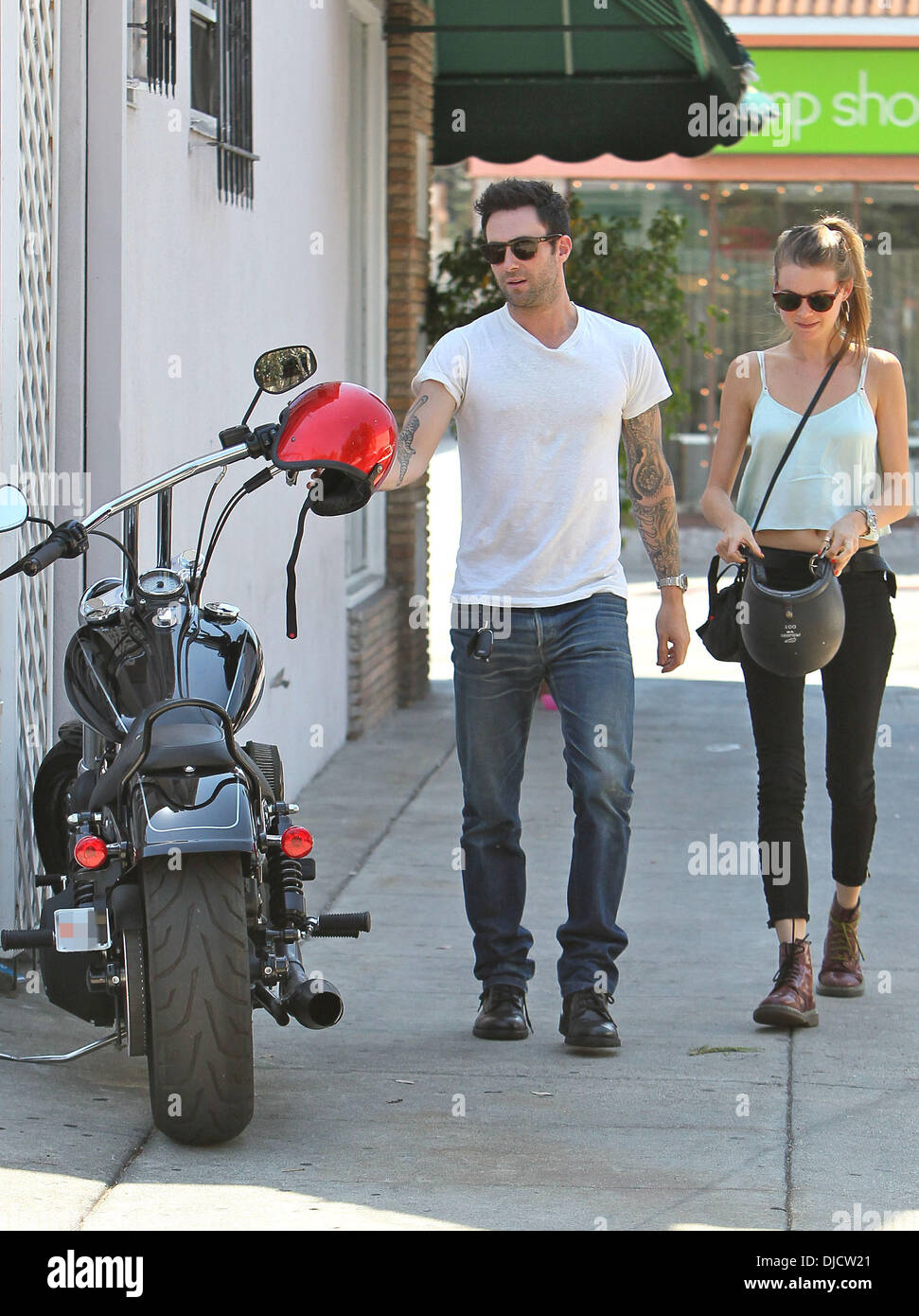 Adam Levine and girlfriend Behati Prinsloo returns to his parked motorcycle  after having lunch at Mustard Seed Cafe in Los Feliz. Los Angeles,  California - 07.08.12 Featuring: Adam Levine and girlfriend Behati