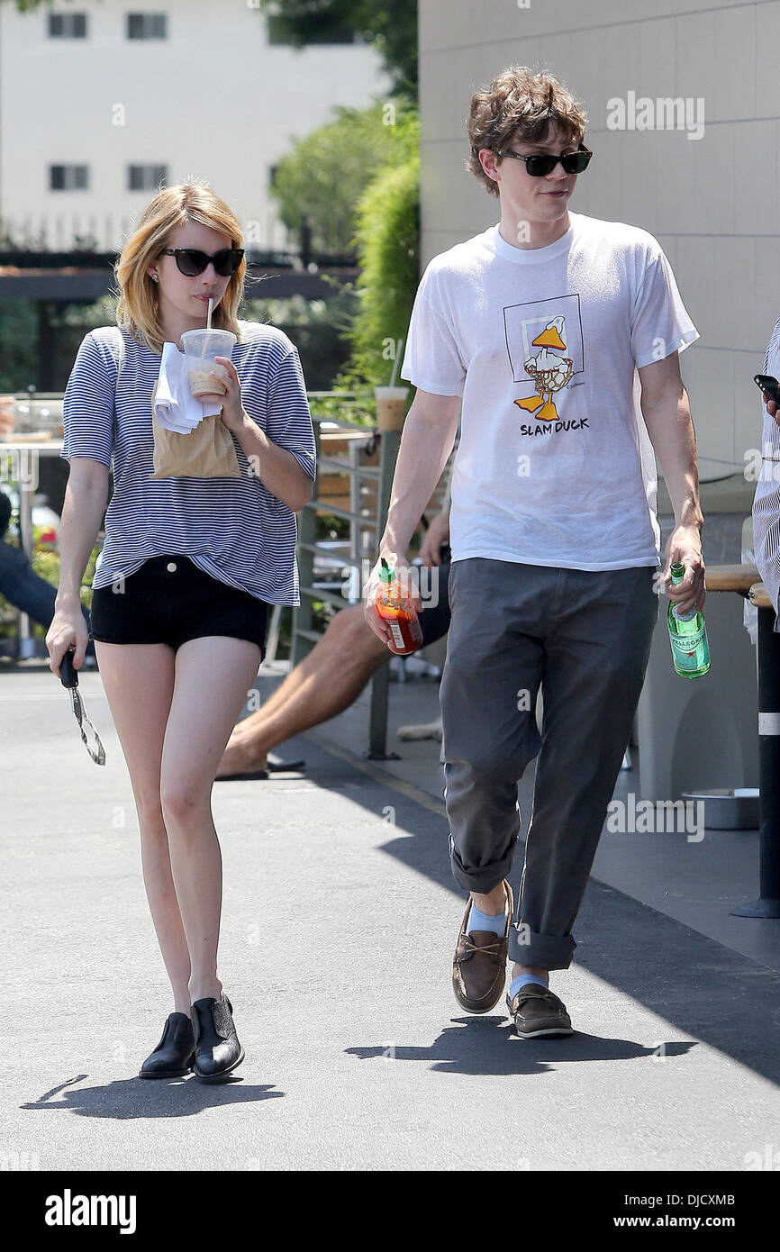 Evan Peters and Emma Roberts returning to their car after eating lunch