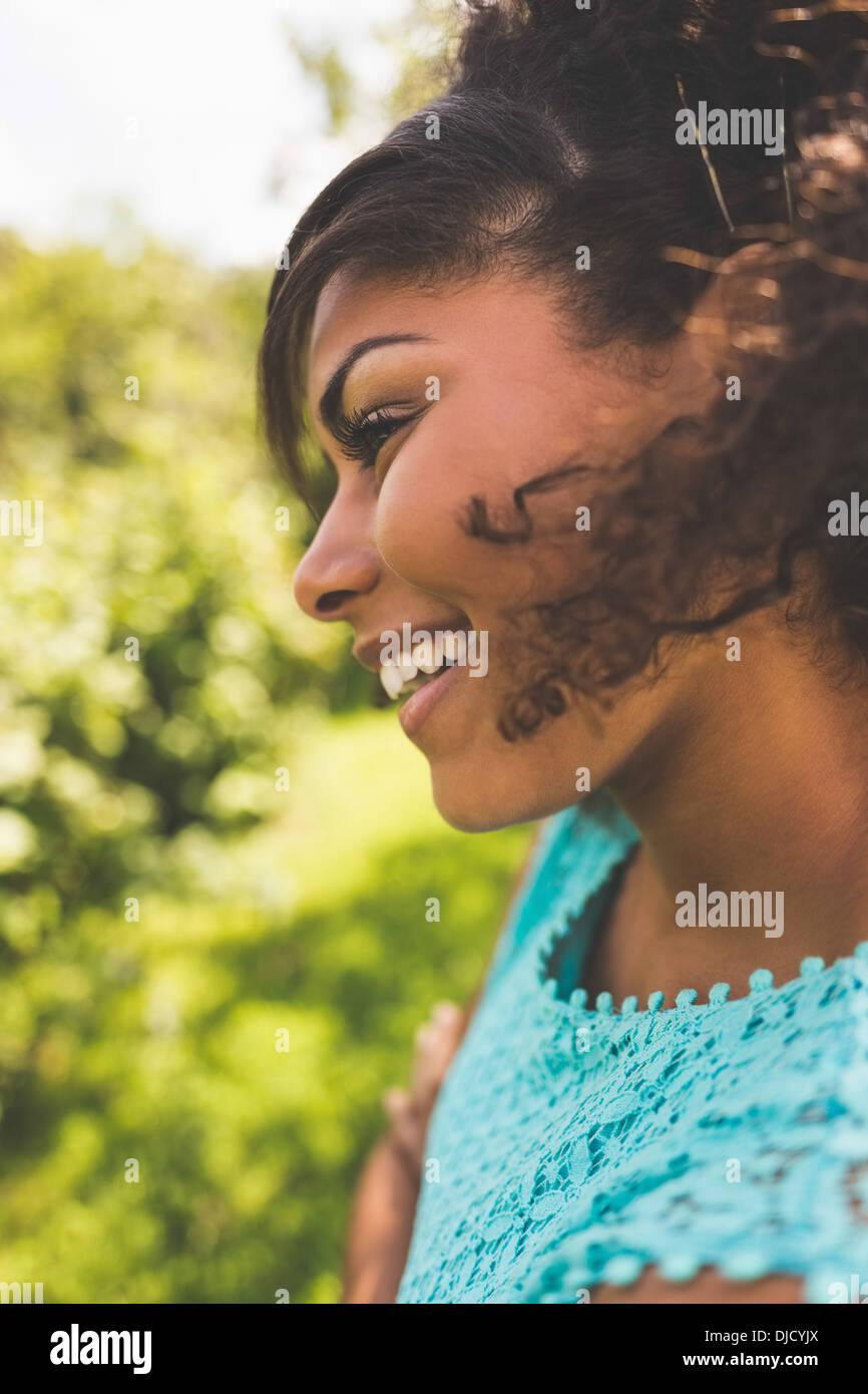 Gorgeous laughing brunette looking away Stock Photo