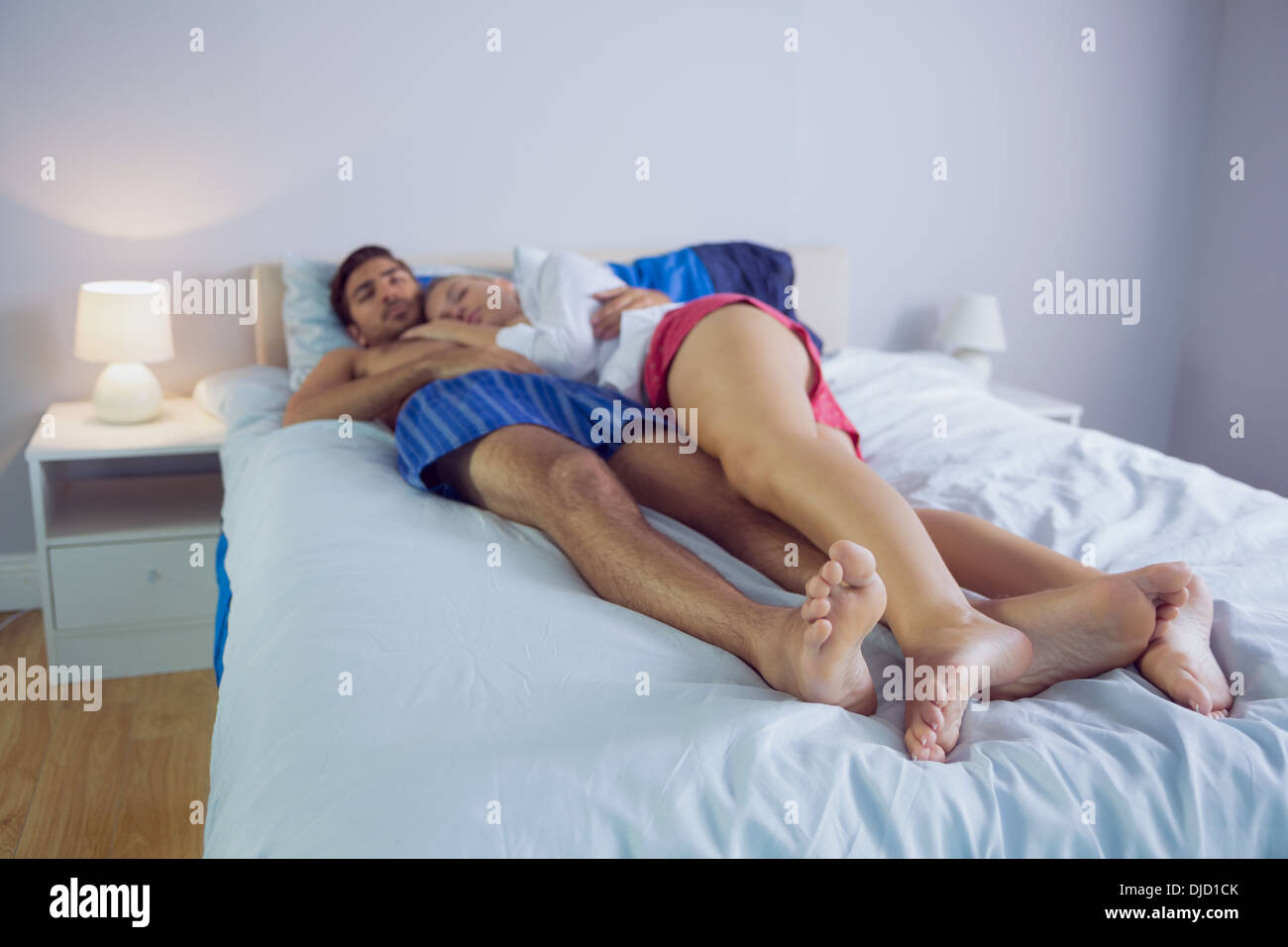 Peaceful woman cuddling with her boyfriend Stock Photo