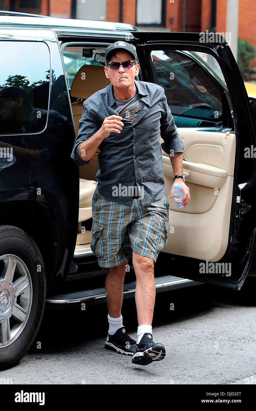 Charlie Sheen climbs out of his suv smoking a cigarette and heads back to  his hotel in Toronto. Sheen made an appearance during the 3rd Annual Joe  Carter Classic Golf Tournament. Toronto,